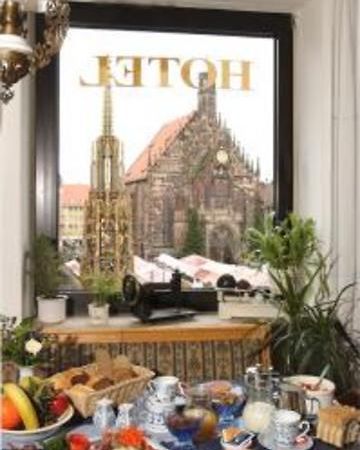 Tiptop Hotel Am Schoenen Brunnen Nuremberga Restaurante foto