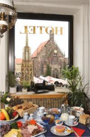Tiptop Hotel Am Schoenen Brunnen Nuremberga Restaurante foto